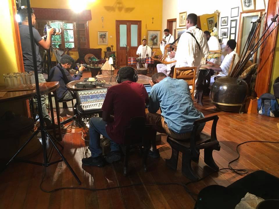 Production crew filming in the villa's historic interior