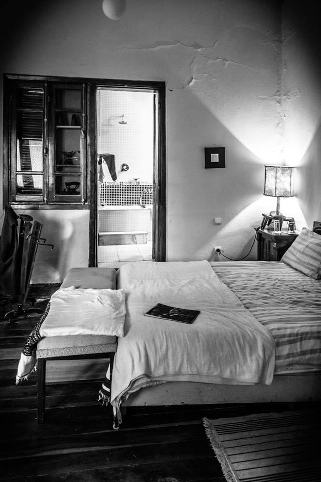 Cozy bedroom with wooden floors and traditional decor